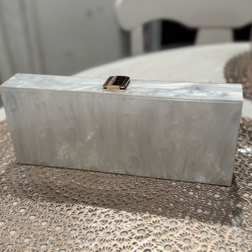 Elegant White Clutch with Gold Clasp
